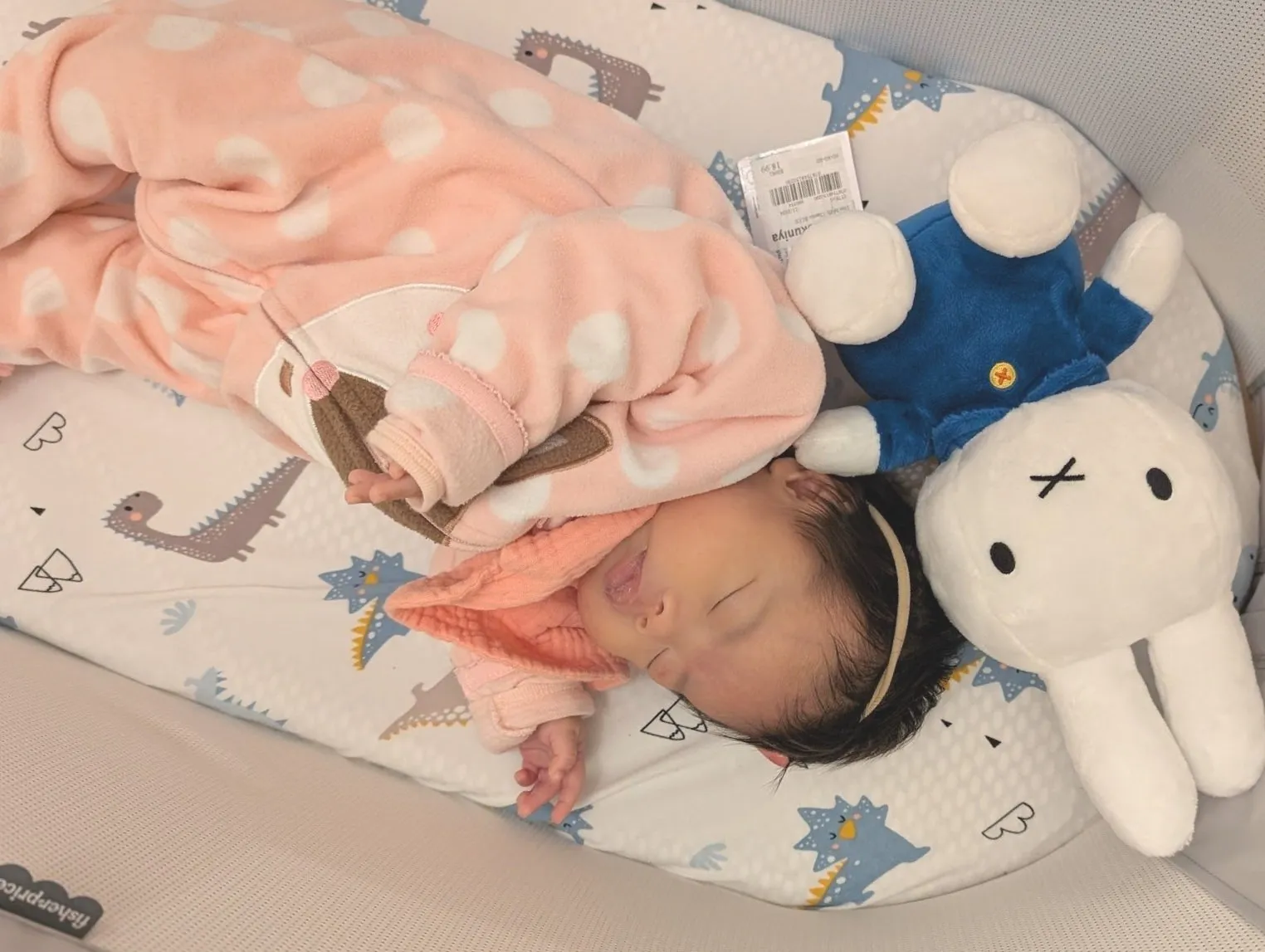 Baby Ce and the miffy that Uncle Johnny brought her.